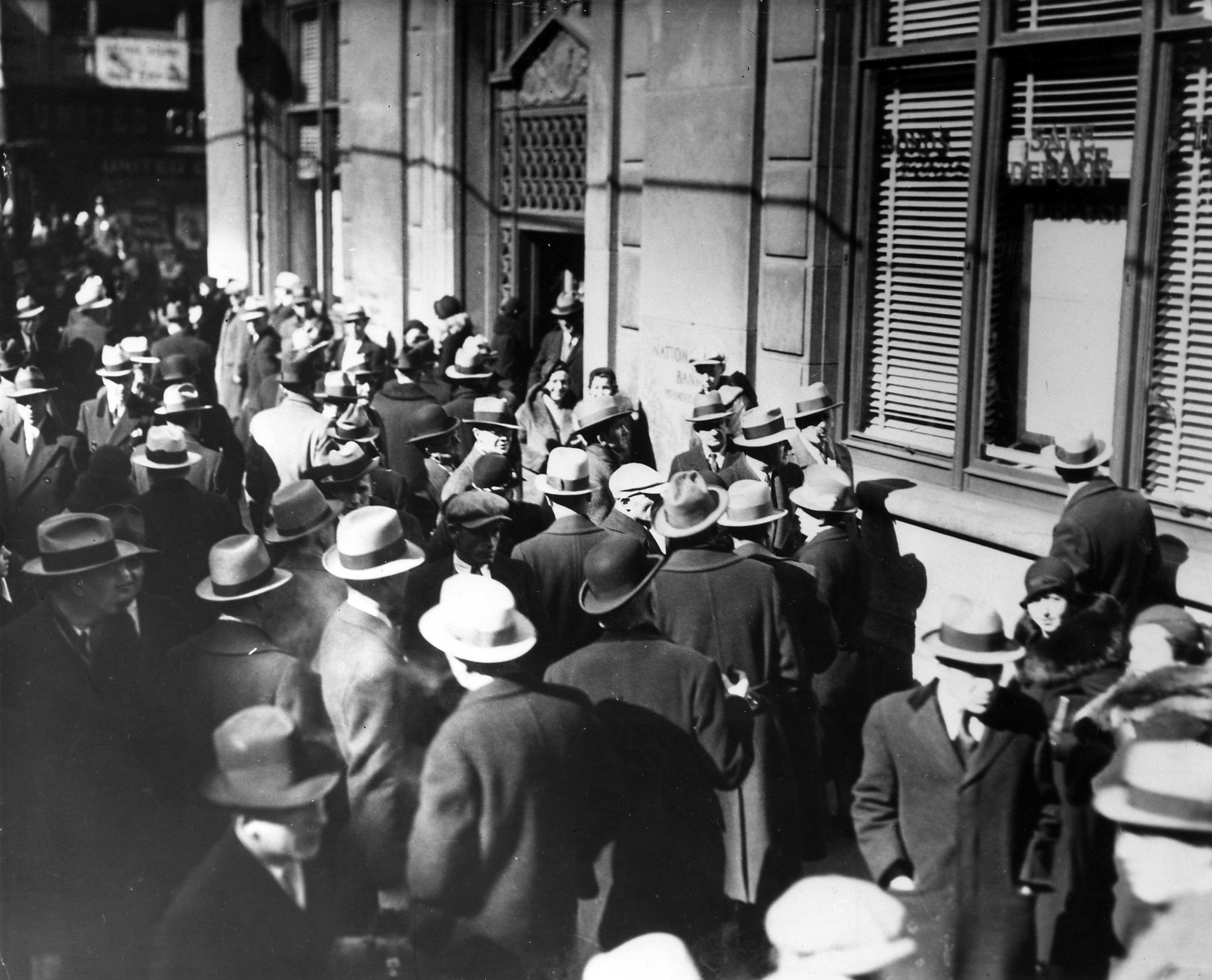 The Great Depression Men on the street during a bank run